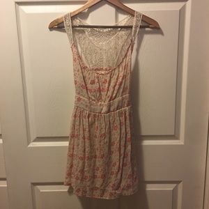 Sheer floral top with lace accents